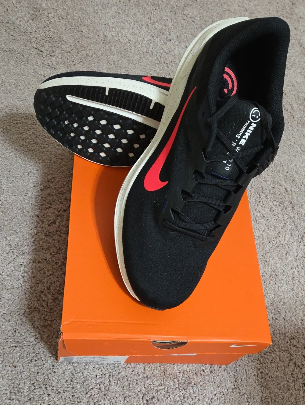 Nike Men’s Black Sneakers with Coral Red Swoosh